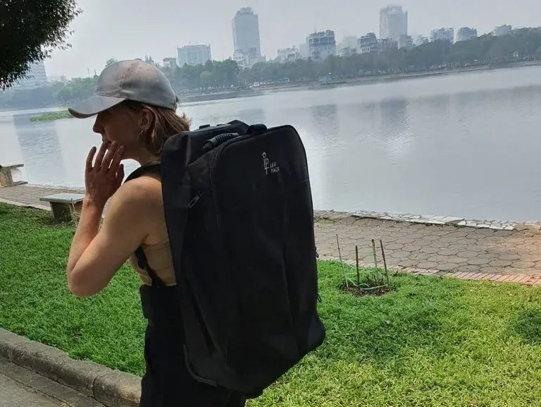 Backpacker with the Legpack in a park in Vietnam